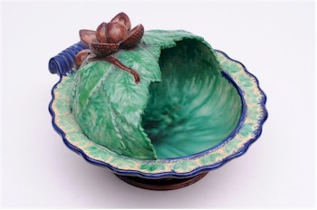 A St Honore pottery chestnut basket, which is archetypal of the majolica produced
            by manufactories in France. (FS17/570).