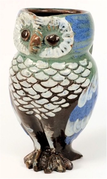 A William Baron Barnstaple pottery owl vase influed by his time at Royal Doulton.