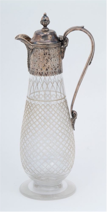 A Victorian claret jug of slender form this time with plain cut lattice decoration to the body, Birmingham, 1864.
