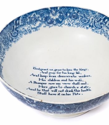 A Staffordshire perarlware punchbowl commemorating King George III and cautioning
        against the spread of French Revolutionary sentiments.