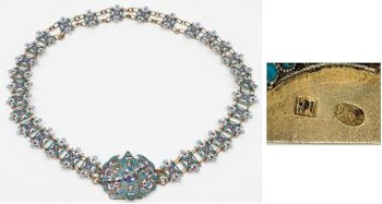 The silver auction includes an impressive Imperial Russian silver and champlevé enamel belt and buckle (FS23/97) that is expected to
        realise between £800 and £1,000.