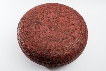 A Fine and Large Chinese Red Cinnabar Lacquer 'Dragon' Box and Cover (FS26/733), which is inviting bids of between £3,000 and
       £5,000.