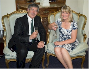 Leigh Extence and Sue Tharby take a seat in a pair of French carved giltwood bergere armchairs in the Louis XV style.