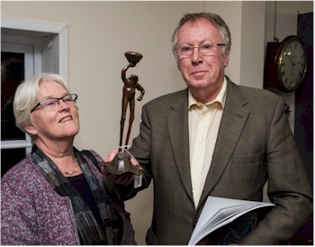 Barbara and Tony Buller look at a bronze figure of a frog from the works of art section of the Fine Sale.