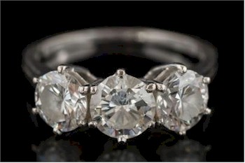There is also a Diamond Three-stone Ring (FS30/230), which is expected to fetch
        between £3,500 and £4,000.