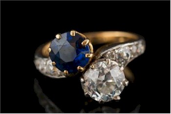 Amongst the rings within the Jewellery auction is a Gold, Sapphire and Diamond Two-stone Cross-over Ring (FS30/228) 
        inviting bids of £2,500-£3,000.