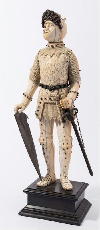 The Works of Art section also includes a large late 19th Century German carved ivory,
        metal and paste mounted figure of a medieval knight (FS33/950).