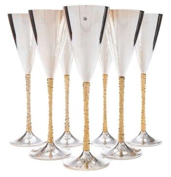 These Seven Elizabeth II Silver and Gilt Champagne Flutes (FS35/4) are being offered
        as part of the silver in our Two Day Fine Art Sale starting on 11th July 2017 at
        our salerooms in Exeter, Devon.