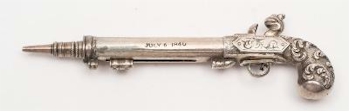 An Unusual Silver Propelling Pencil in the form of a Flintlock Pistol by Samson & Mordan (SC25/1085).
