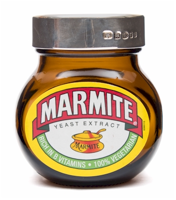 A silver topped Marmite jar. Estimate £50-£70.