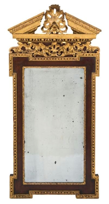 A 19th Century walnut and parcel gilt architectural mirror in the George II taste (FS37/1209) was fiercely fought for
        eventually selling for £5,400.