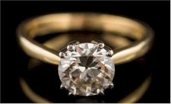 This diamond solitaire ring (FS37/509) sold for £5,000.