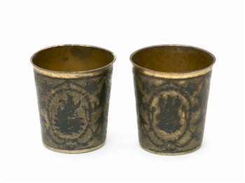 A pair of late 18th century Russian silver gilt and niello decorated vodka beakers (charka) dating from 1789.