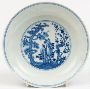 A Chinese porcelain plate painted with The Three Friends.