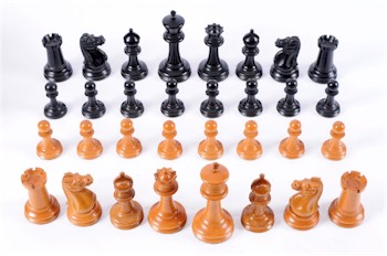 A Staunton pattern chess set (FS11/531) in natural and stained red ivory.