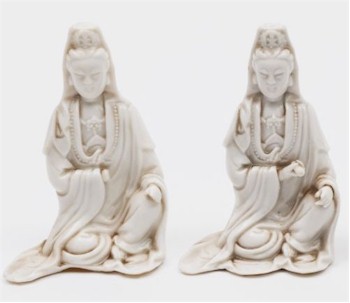 A pair of Blanc de Chine figures of Guanyin.
