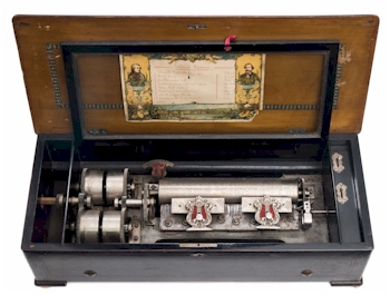 A double wound musical box with tune indicators.