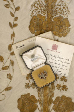 Royal Robes, with Letter and Broach.