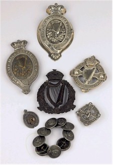 Royal Irish Constabulary helmet badge, silver badges and other related pieces that fetched £5,400