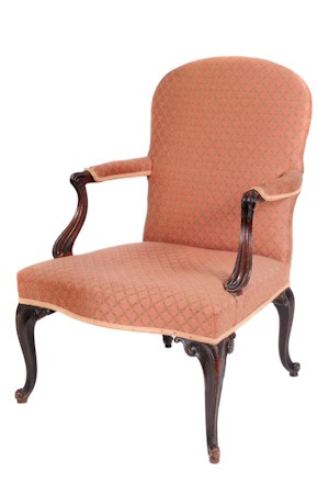 An attractive George III open armchair in the Hepplewhite taste. Estimate £1,200-£1,500.