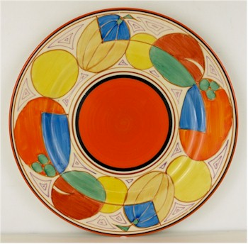 A Clarice Cliff Melon (Picasso fruit) pattern plate. Estimate £80-£100.
