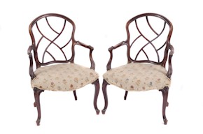 A Pair of George III armchairs in the French Hepplewhite taste (FS12/860).