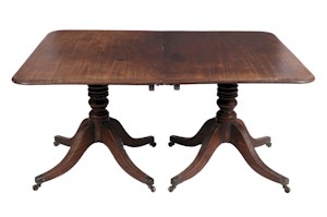 A twin pillar Regency dining table (FS12/928).