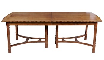 Peter Van Der Waals: A solid English walnut extending dining table (FS15/793a). Estimate £4,000-£6,000.