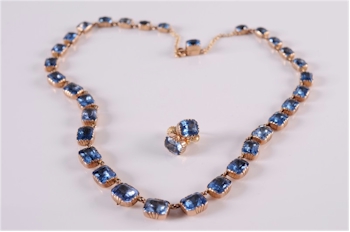 An early 20th century gold and blue paste riviere necklace with matching earrings. (FS15/164).