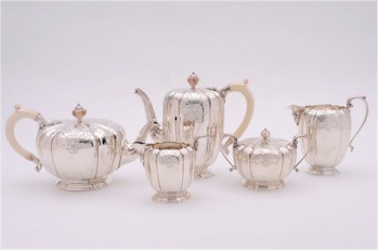 An Elizabeth II five-piece tea and coffee service, which is being offered in our three day fine sale at the end of January 2013. (FS17/231).