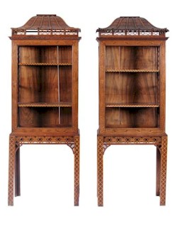 A pair of carved padouk upright display cabinets in the Chinese taste was the top
        lot in the January 2013 Fine Art Auction at Devon Auctioneers, Bearnes Hampton &
        Littlewood. The lot attracted fierce competition from eight telephone bidders and
        finally realised a stunning £36,000. (FS17/864).