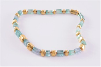 An 18ct gold and tourmaline bead necklace (FS18/152) by highly collectable contemporary jeweller Charmian Harris is being offered in the April 2013 Fine Sale.