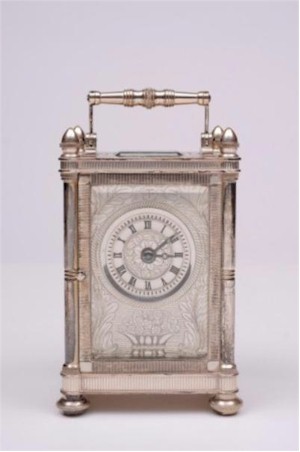 The rare Mappin & Webb solid silver bicentenary carriage clock (FS18/762) was keenly fought over, realising £1,300 when the hammer fell
        in the antique clock section of the April 2013 Fine Sale.
