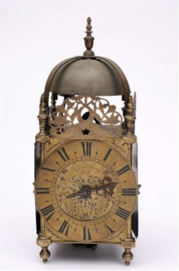 A lantern clock signed 'Richard Tracy fecit' (FS18/772) attracted considerable pre-sale attention and eventually succumbed to a bid of £3,200, in the
       antique clock auction held within the April 2013 Fine Sale.