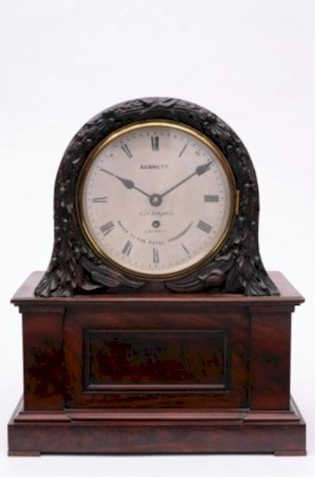 A mahogany library clock, with a single fusee movement and carved decorated case, by the prominent clockmaker Sir John Bennett FRAS (1814-1897) fetched £490 (FS18/770).