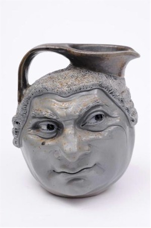 A Martin Brothers Barrister Jug (FS19/431), which is both quirky and unusual, is expected to fetch between £2,000 and £2,500
        in a sale that is being supported by live online bidding over the Internet.