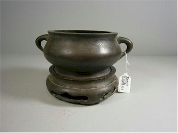 Another bronze censer and stand in the Works of Art auction fetched £3,800 (FS19/522).