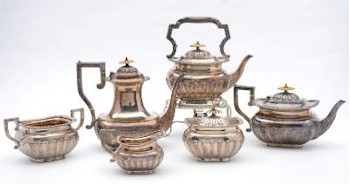 A George V Silver Six Piece Tea and Coffee Service, Maker JT & Co, Sheffield, 1923 (FS19/21) realised £1,850.