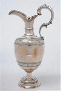 Despite a couple of dents, this Victorian silver wine ewer (FS19/66) proved that
        wine-related silverware is currently holding up well, selling for £1,000.