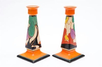 A pair of Clarice Cliff Autumn Balloon Trees candlesticks (FS13/360), circa 1932,
        which realised £580 in pottery auction of our January 2012 Fine Sale.