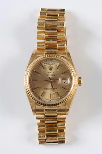 There is a very popular and highly collectable 18ct gold Rolex Oyster Perpetual wristwatch, which is inviting bids of around £4,000 to £5,000.