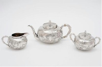 A three-piece Chinese Silver Tea Set (FS20/115) made for the export market and estimated at between £400 and £500.