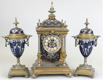 A 19th Century French Brass and Champleve Enamel Clock Garniture (HO81/362), which was sold as part of the
        regular antiques and collectables auction, sold for £600.