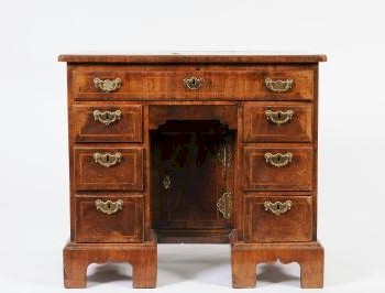 An Early 18th Century Walnut and Feather Banded Kneehole Desk (FS21/875) offered in our Two Day Fine Art Sale starting on 21st January 2014 at our salerooms in Exeter, Devon.