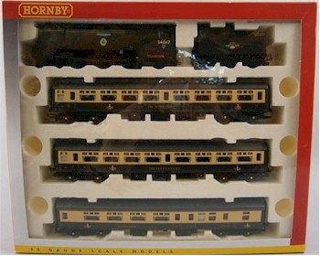 A Hornby limited edition traint set entitled 'The Excalibur Express Train Set' (SC18/484) comprising a 2-6-2 locomotive No 34067 'Tangmere' with a six wheel tender and three passenger coaches, is estimated at £40-£60.