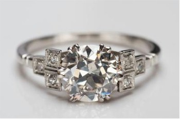 A diamond mounted, single stone ring with a round old brilliant cut stone (FS22/263) is inviting bids of £2,500 and £3,000.