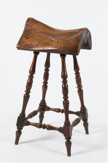 A rare Victorian pine and fruitwood saddle template (FS22/1037), also part of the Nye Collection of Furniture, is expected to
        realise between £400 and £600.