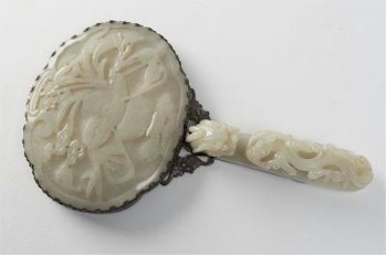 This stunning Chinese jade and silver mounted hand mirror (FS22/713) is being offered in the Works of Art Auction of the Spring 2014 Fine Sale and is inviting 
        bids of between £4,000 and £6,000.