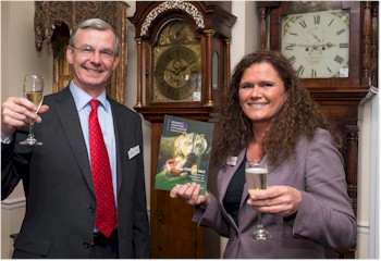 Martin McIlroy and Rachel Littlewood, with the Bearnes Hampton & Littlewood
        Spring 2014 Fine Sale catalogue, at the preview evening of the Spring Fine Sale.