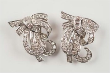 A pair of diamond brooches (FS23/168) are expected to command between £1,500 and £1,600 in the jewellery auction of the Summer 2014 Fine Sale.